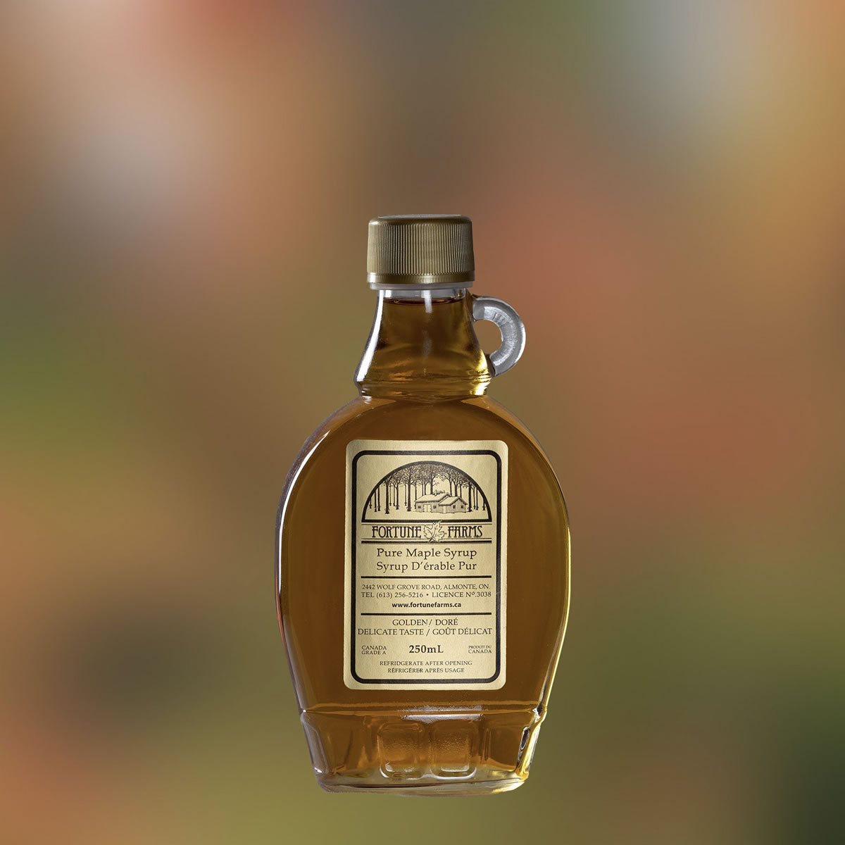 Photo of a single 250ml glass bottle of maple syrup