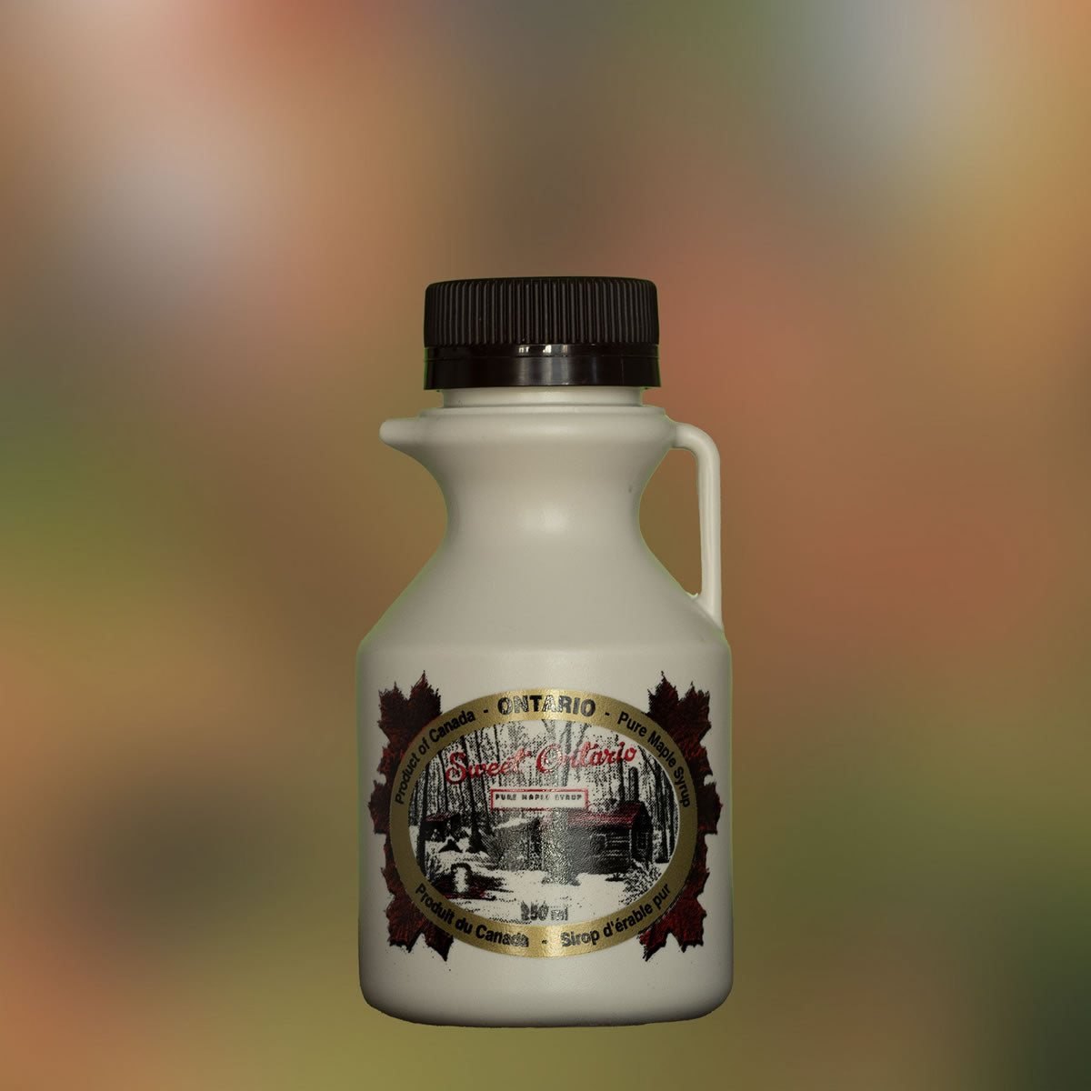 Photo of a single 250ml plastic jug of maple syrup